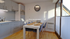 Dwupoziomowy Apartament z Widokiem na Giewont w Kościelisku   

 Oferujemy na sprzedaż przestronny, dwupoziomowy apartament z w