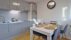 Dwupoziomowy Apartament z Widokiem na Giewont w Kościelisku   

 Oferujemy na sprzedaż przestronny, dwupoziomowy apartament z w