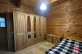 Drewniany dom premium nad stawem | 1 ha | Sauna |