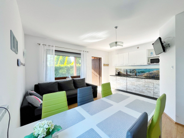 Apartamenty, domki nad morzem - Sarbinowo. Wśród zieleni dla dzieci