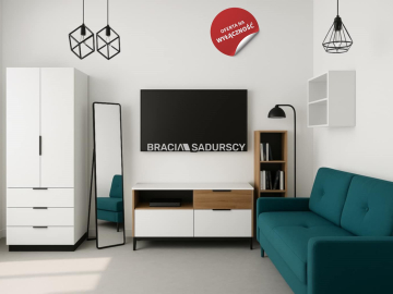 Wygodna kawalerka w apartamentowcu.