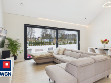 Dom jednorodzinny parterowy - projekt `Ekonomiczny 4T` , Gorzyca, gm. Lubin  
  
Ten dom łączy funkcjonalny projekt parterowy z