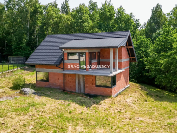 DOM POD LASEM NA WIDOKOWEJ DZIAŁCE