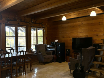 Drewniany dom z działką, sauną i garażem