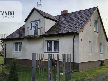 Dom z zabudowaniami na działce 1,24 ha