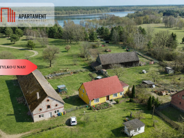 Siedlisko w sąsiedztwie jeziora i lasu