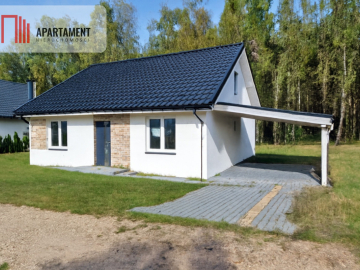 Dom jednorodzinny pod lasem.