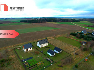 Budynek mieszkalny z domkami rekreacyjnymi.