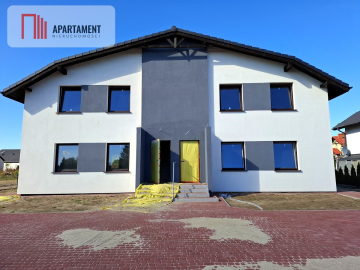 Mieszkanie w czterolokalowym budynku z ogródkiem