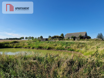 Atrakcyjna działka siedliskowa ze stawem