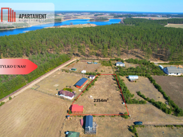 Działka rekreacyjna z domkiem letniskowym.